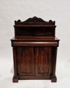 Victorian rosewood chiffonier, the upstand with carved scrolling top rail and shelf over a cushion