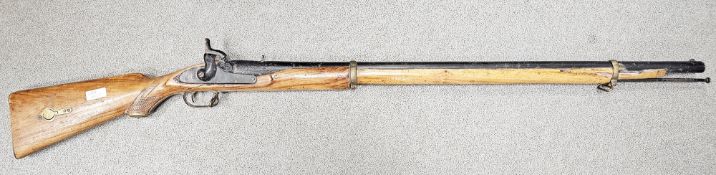 Reproduction percussion cap musket with wooden stock and shaft, iron barrel and ram rod and brass