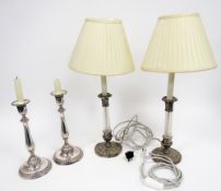 Pair of silver-plated armorial candlesticks in the Georgian style, of baluster form, gadrooned &
