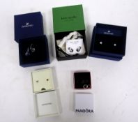 Five boxed pairs of earrings including Swarovski stud earrings, Swarovski glass earrings,