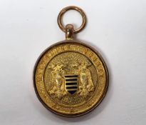 9ct gold and enamel sporting medallion by Thomas Fattorini, Hockley Street, Birmingham, 6g approx
