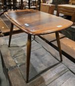 Ercol elm and beech Windsor coffee table/side table model 213, of rounded rectangular form on turned