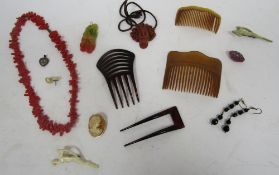 Art Nouveau-style carved resin pendant of a lady's head, 6cm high, a carved and stained bakelite