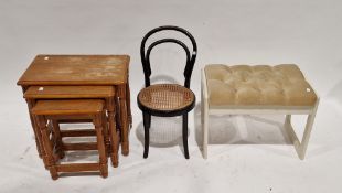 Ebonised bentwood child's chair with cane seat, 63cm high x 32cm wide, a nest of three oak tables,