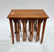 Danish Poul Hundevad mid-century nest of teak tables comprising a rectangular table on castors