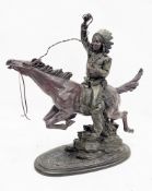 In the manner of Frederick Remington, a bronzed resin sculpture of a native American chief on