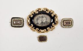 Two Georgian hairwork and pearl mourning brooches and another Georgian hairwork mourning brooch, all