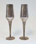 Pair of 20th century parcel-gilt silver champagne flutes by Stuart Devlin, London 1978, with