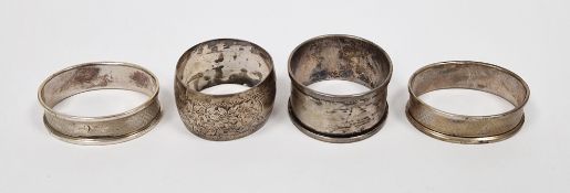 Edwardian silver napkin ring, foliate engraved, Birmingham 1906, a pair of silver napkin rings, each