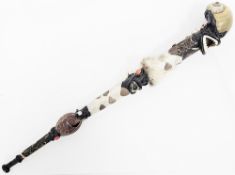 Ethnographic ritual short staff constructed from natural materials including a large snailshell