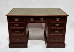 Victorian mahogany twin pedestal desk, the rectangular top with green leather inset writing