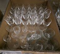 Large collection of drinking glasses including five ale glasses with handpainted decoration of