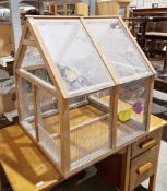 Rabbit/small pet hutch, the wooden frame having an apex roof, clear plastic and mesh panels, 82cm