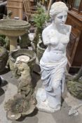 Cast resin statuette after the Venus de Milo, 117cm high and a birdbath of flower design resting
