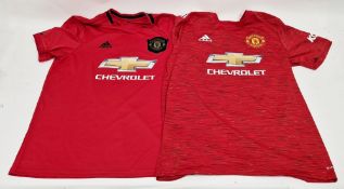 Manchester United 2019/20 season home shirt, size L, together with a 2020/21 season home shirt, size