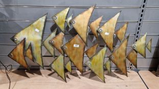 Abstract metal wall art sculpture of triangular swimming fish, 60cm high x 101cm long