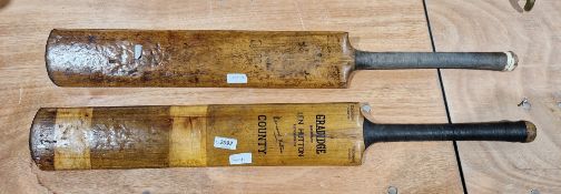 Two vintage cricket bats, one being a Slazenger Gradidge Len Hutton autographed bat with facsimile
