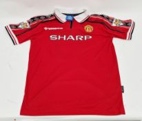 Manchester United 1998/99 home shirt, by Umbro, sponsored by Sharp, with F.A. Premier League