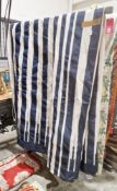 Large printed canvas rug, navy blue/black striped and detail on a white ground, reversible, 350cm