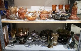 Collection of carnival glass, amber, gold and petrol tinted, including: frilled bowls,  vases,