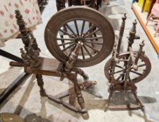 Two 19th century spinning wheels, one with bone mounts (both damaged), largest 114cm high (2)