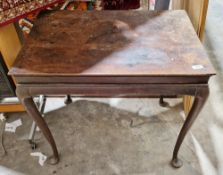 18th/19th century mahogany side table, drawers to either end, on four cabriole legs with pad feet,
