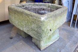 Reconstituted stone quarter round garden planter on two supports, 59cm wide x 43cm high
