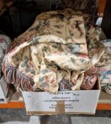 Assorted cushions and a floral pelmet with full rope fringe