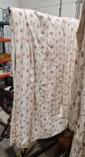 Three pairs of curtains, white printed with ferns and leaves, in pale pinks, lined and