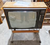 Mid-century Philips 20 C 933 television, teak cased, on a chromed stand with wheels together with