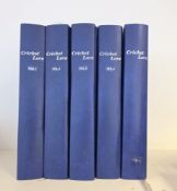 Five bound volumes of Cricket Lore in blue folders