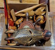 Quantity of wooden wares including a tribal-style mask in the form of a zebra, a ships wheel