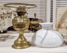 Brass oil lamp with milk glass shade