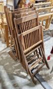 Four teak slatted folding garden chairs (4)