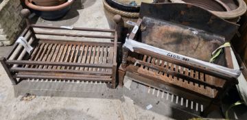 Two cast iron firegrates, one with built in fireback, largest 51cm wide x 32cm deep x 19cm high (2)