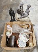 Resin model of boys on top of a rock, a cut glass and metal-mounted claret jug, a Michael Garman