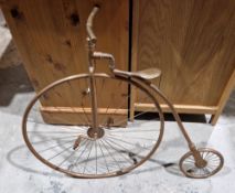 Vintage copper small model of a pennyfarthing formed from copper piping (please note VAT will be