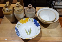 Pair of stoneware flagons tops reading James Lombard Wine Merchant, Fermoy, impressed mark, Price 15