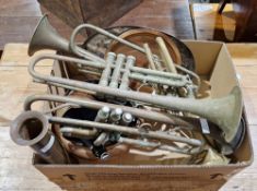 Box of brass trumpets and other instruments, a copper bowl, silver plated trophies and other