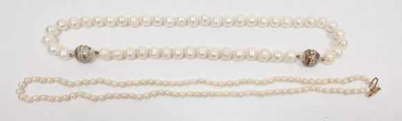 Single strand pearl neckclass with 9ct gold clasp and a cultured pearl adjustable necklace/