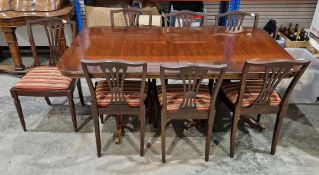 A Bevan Funnell Reprodux mahogany twin pedestal extending dining table in the Regency manner, the