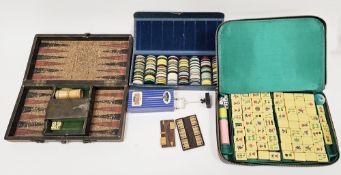 Mid-20th century mahjong set comprising 148 yellow plastic playing pieces in a leatherette case,