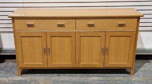 Morris Furniture Company of Scotland modern light oak sideboard comprising two frieze drawers over