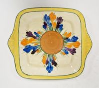 Clarice Cliff plate and dish comprising a Crocus pattern two-handled square dish, printed Bizarre