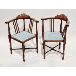 Pair of Edwardian mahogany corner chairs, the top rails inlaid with a roundel of tulips, string