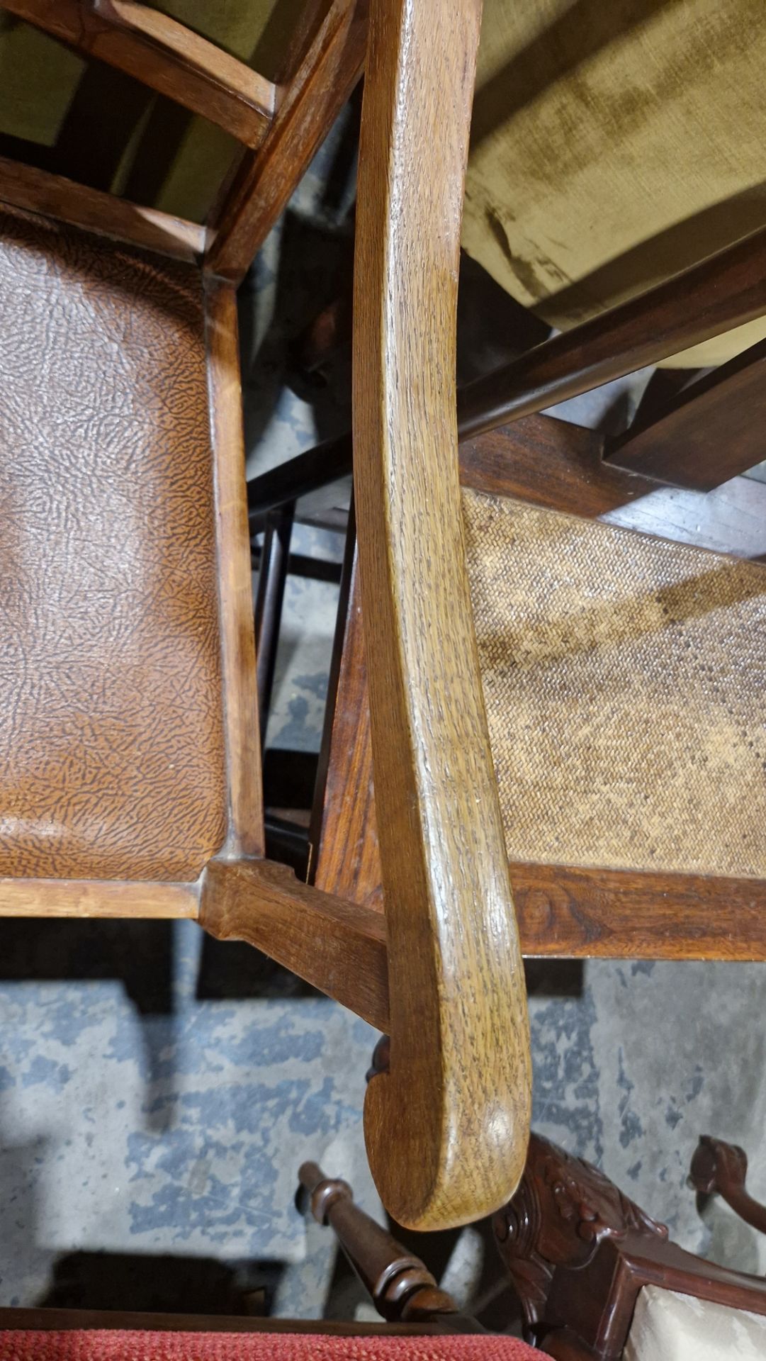 In the manner of the Cotswold School an Arts and Crafts pale oak elbow chair with lattice back, - Image 3 of 14