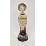 Shelagh Spear raku figure of a standing woman, with headdress and arms crossed, on a domed base,