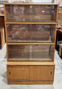 Mid-century Simplex sectional library teak stacking bookcase comprising three sections with glass
