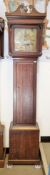 George III oak longcase clock, the scrolling pediment with brass eagle and ball finial, the hood