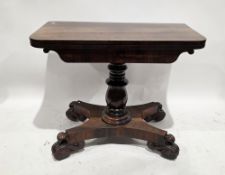 Early 19th century rosewood fold-over card table, the rectangular top with rounded front corners,